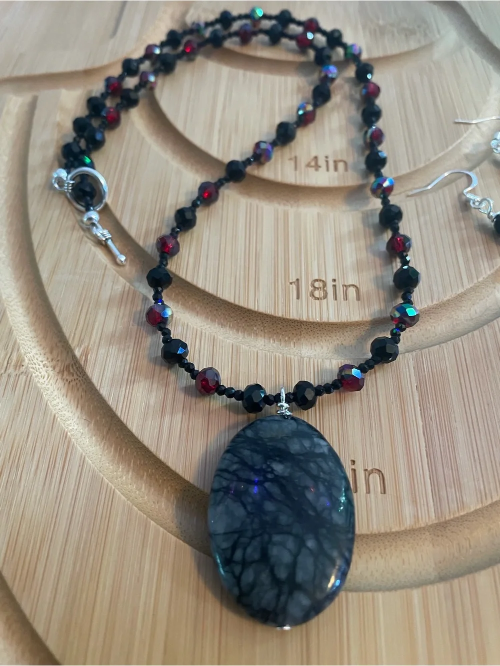 Handcrafted Black and Garnet Beaded Necklace with Oval Stone Pendant